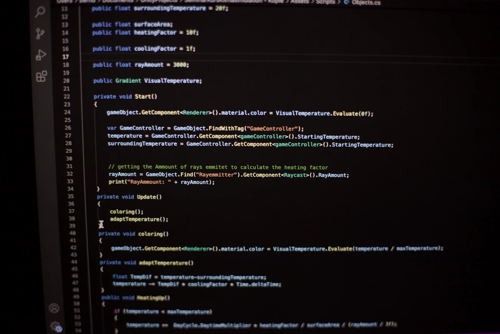 Code editor glowing on a dark computer screen