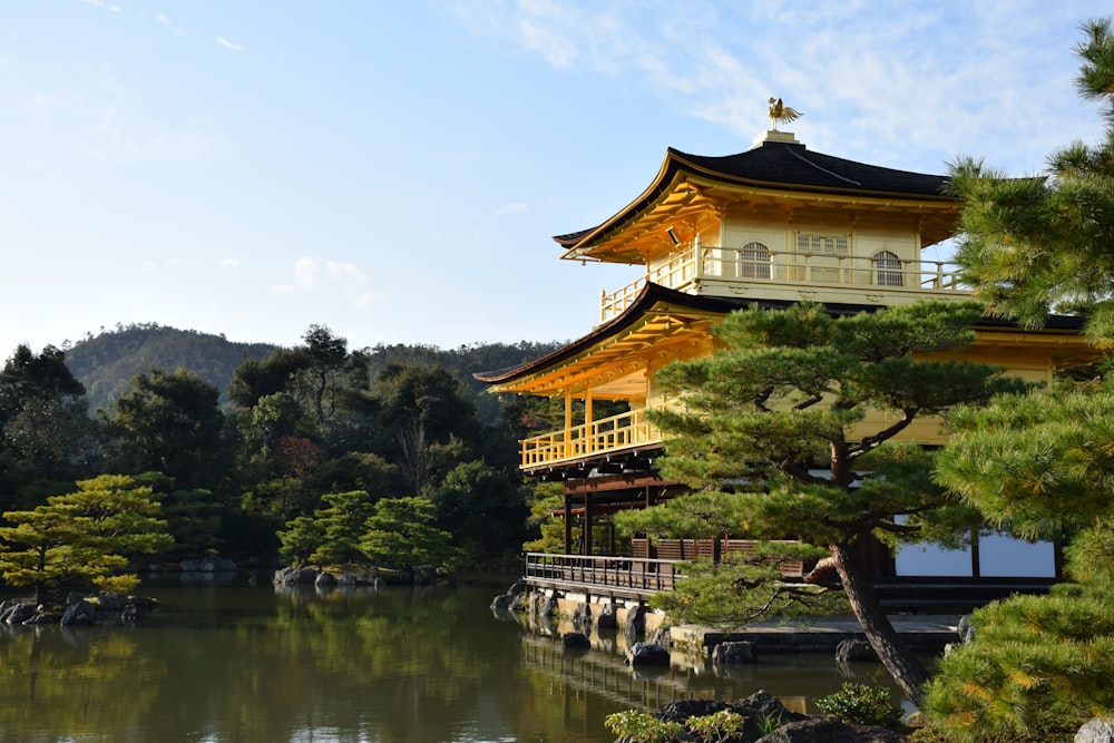 a large building sitting next to a body of water