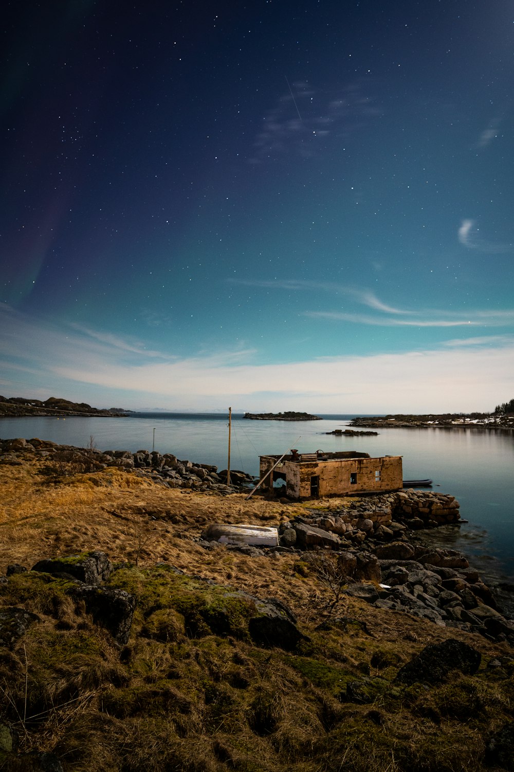 a boat sitting on top of a body of water