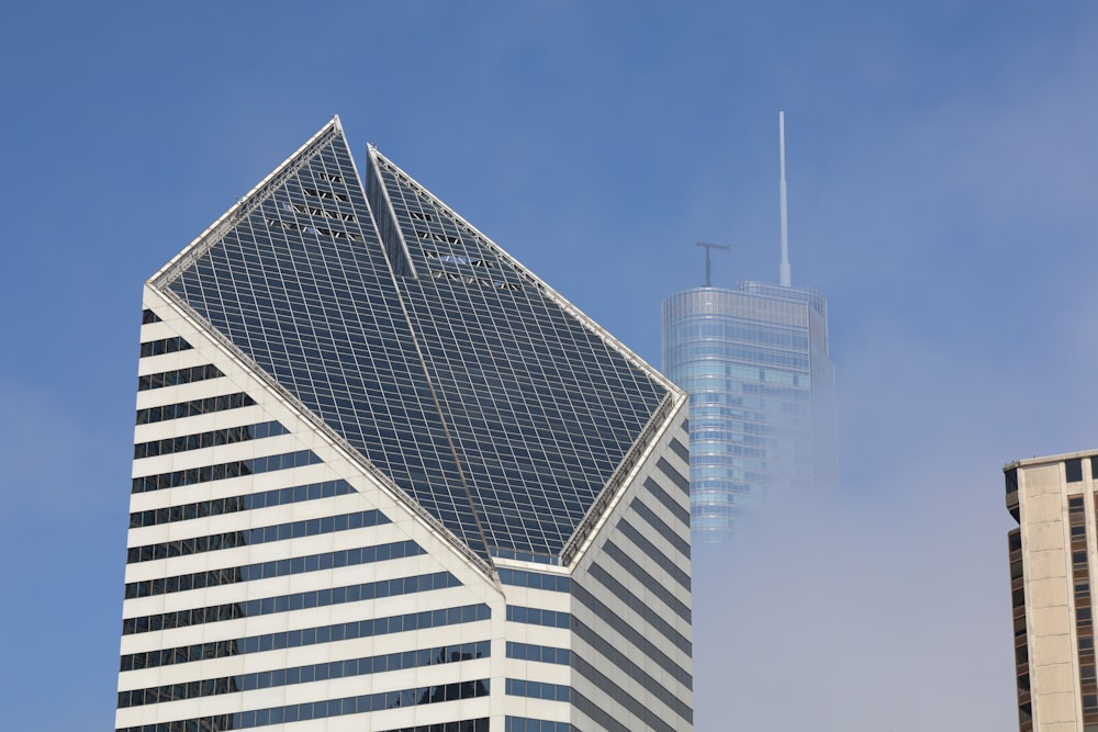 a very tall building next to a very tall building