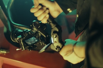 a person holding a camera in their hand