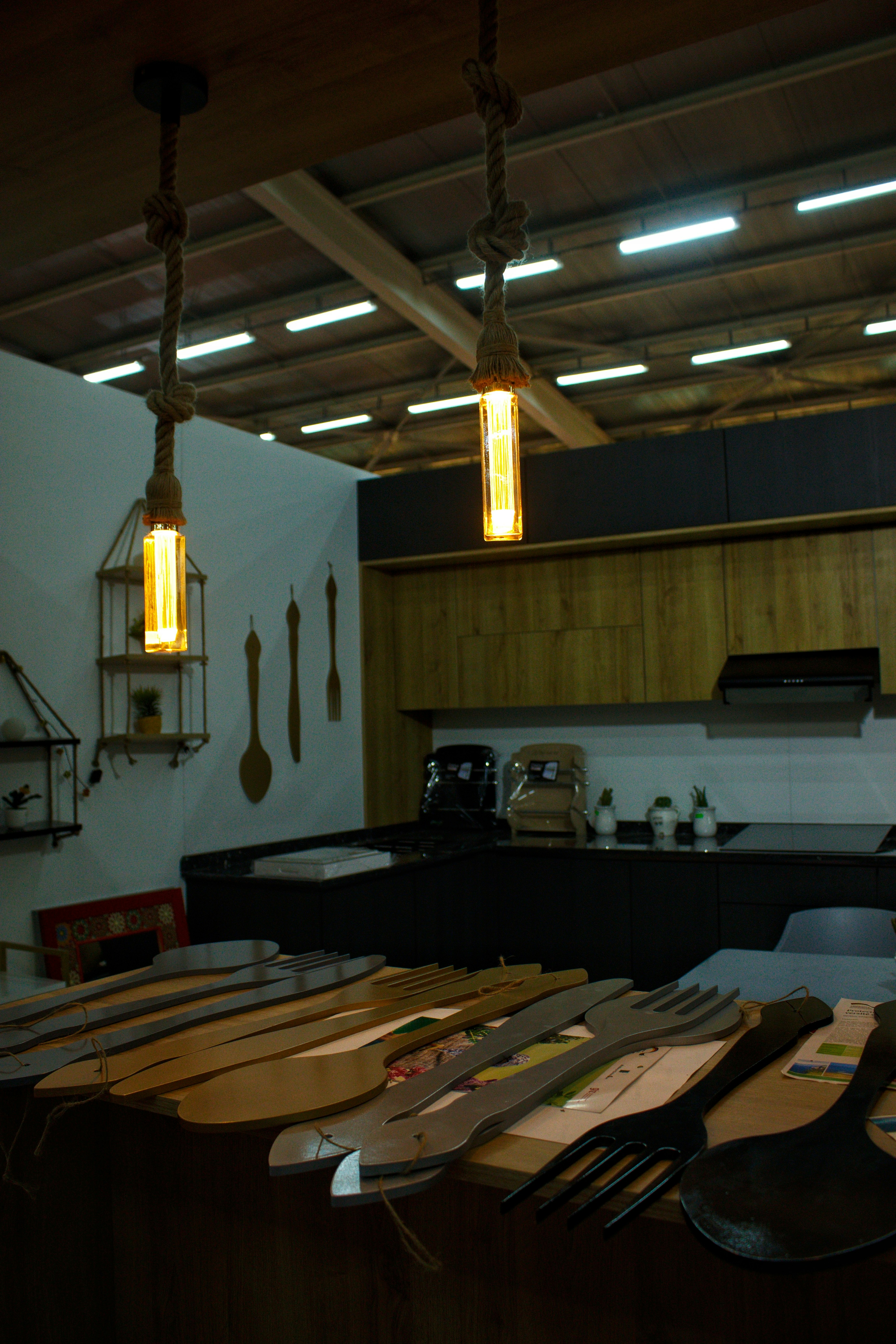 a kitchen filled with lots of wooden utensils