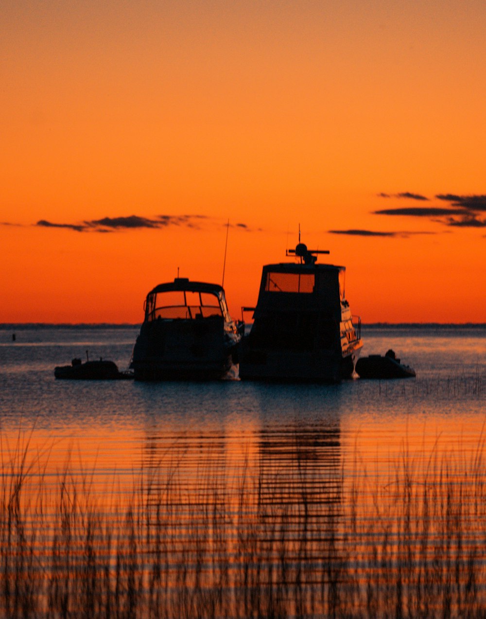 a couple of boats that are sitting in the water