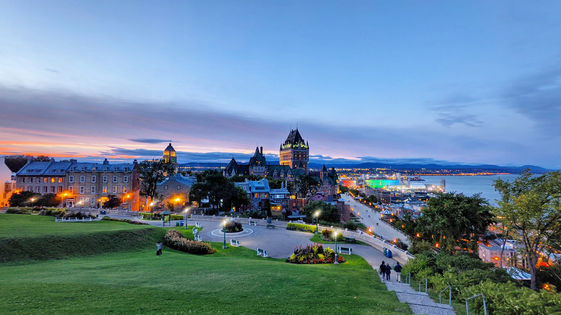 a scenic view of a city at dusk