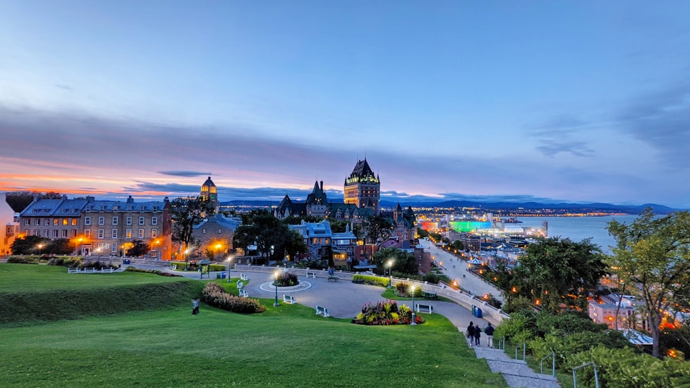 a scenic view of a city at dusk