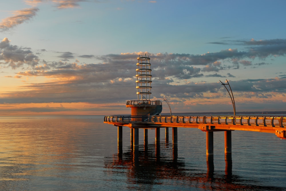 a pier that has a tower on top of it