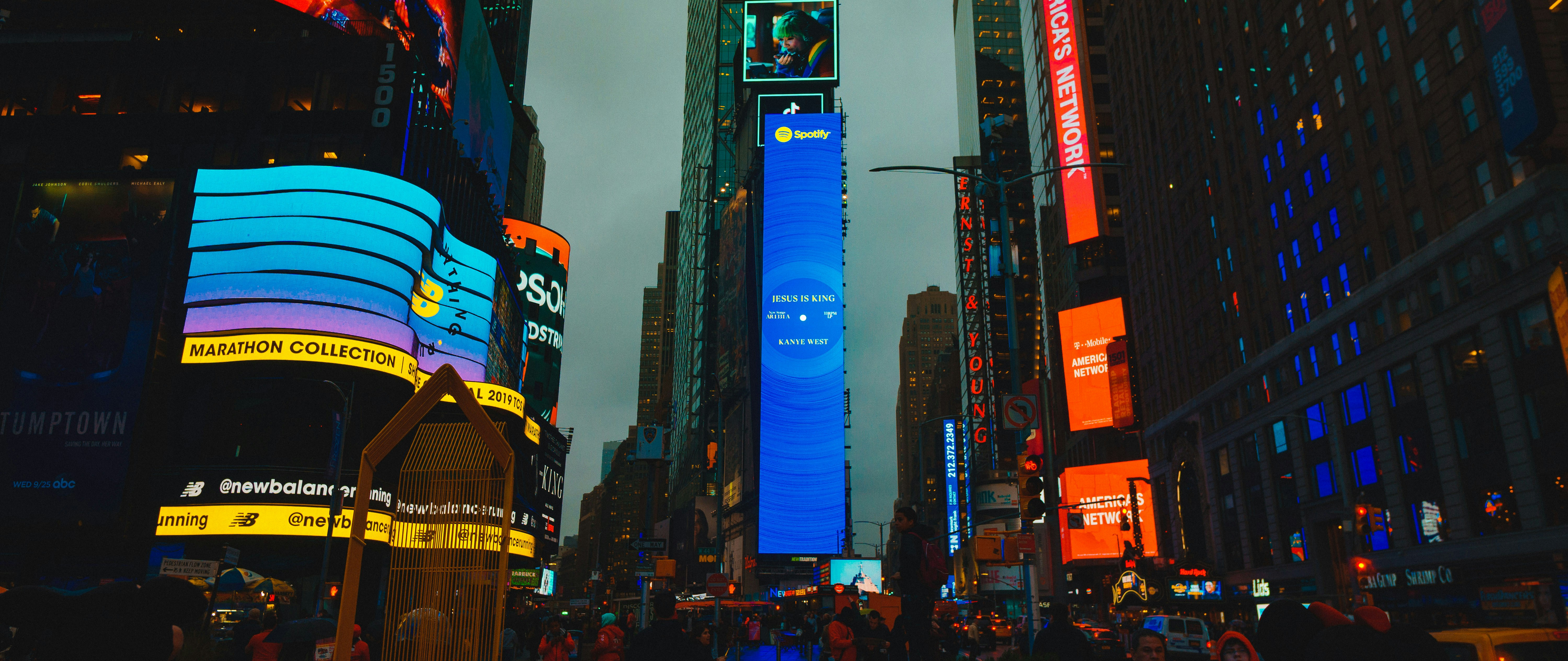 a city street filled with lots of tall buildings