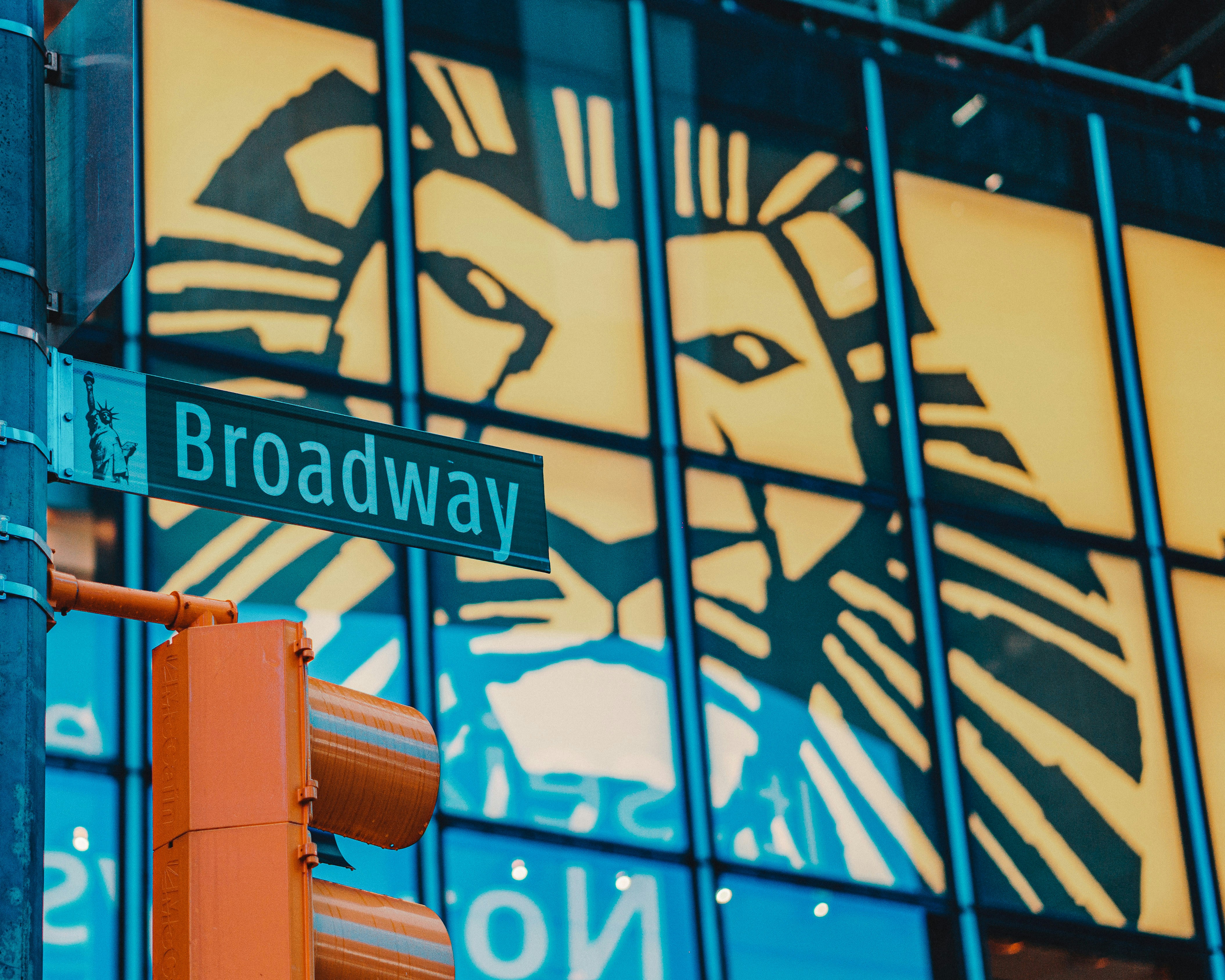 a close up of a street sign near a building