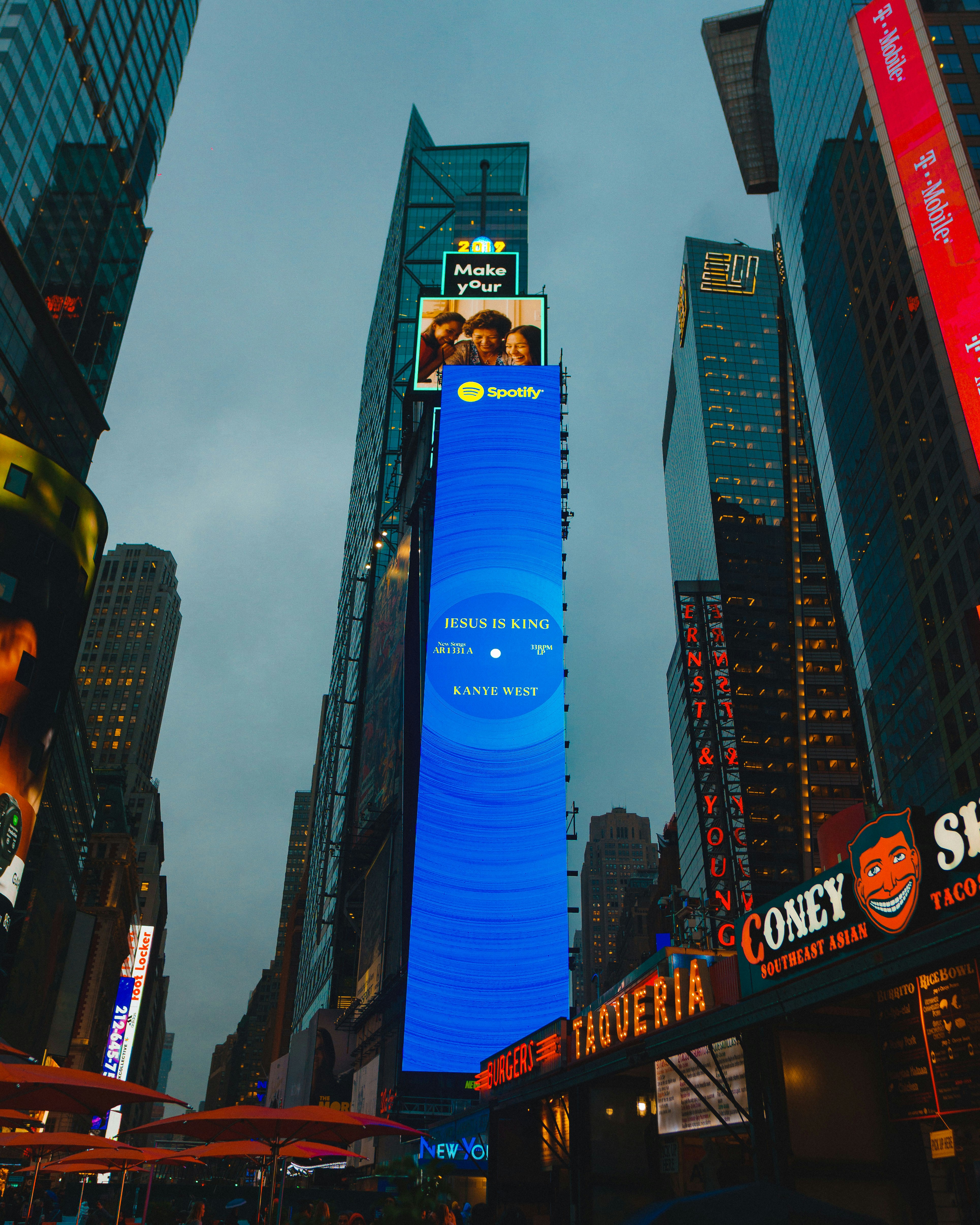 a city street filled with lots of tall buildings