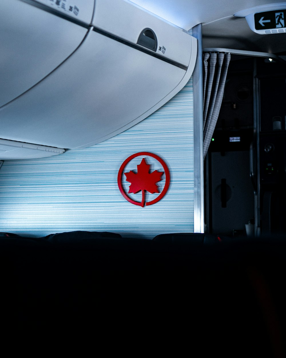 a canadian maple leaf on the side of an airplane