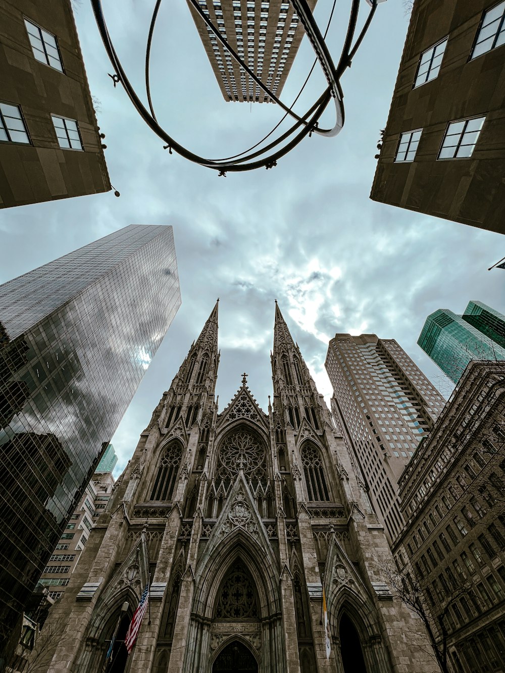 looking up at a cathedral in a city