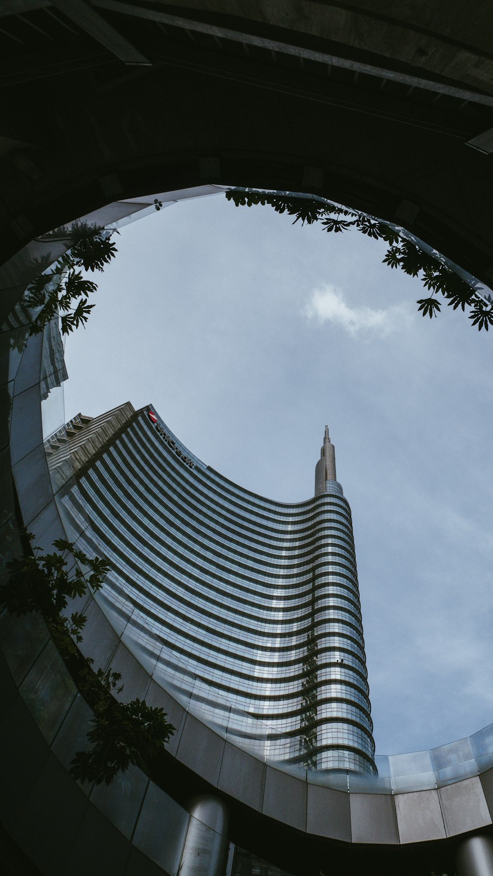 a very tall building with a clock on it's side