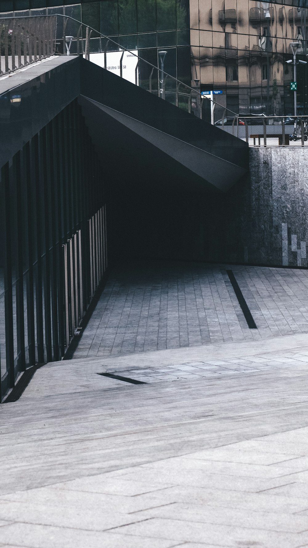 a man riding a skateboard down a ramp