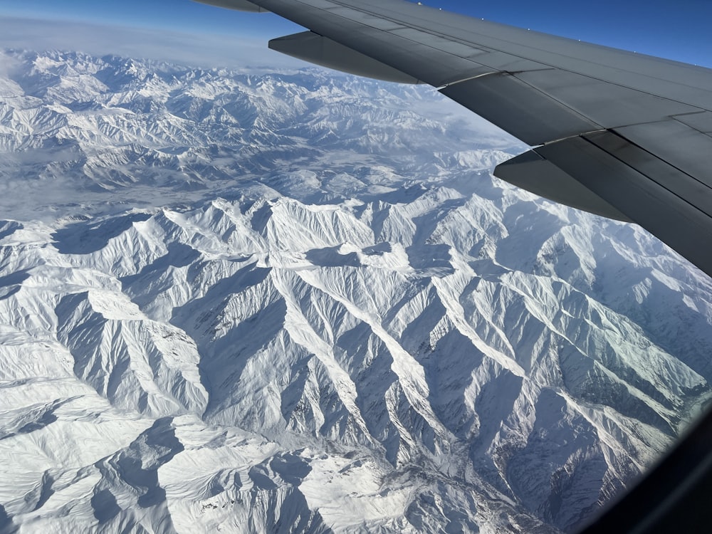 a view of a mountain range from an airplane window