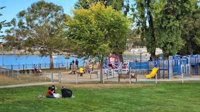 A vibrant community park with families enjoying leisure time.
