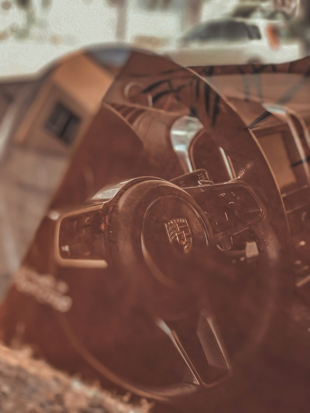 a close up of a steering wheel of a car