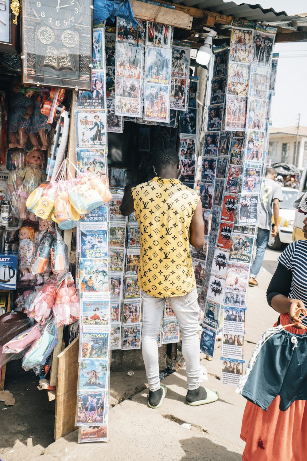 a man standing in front of a store