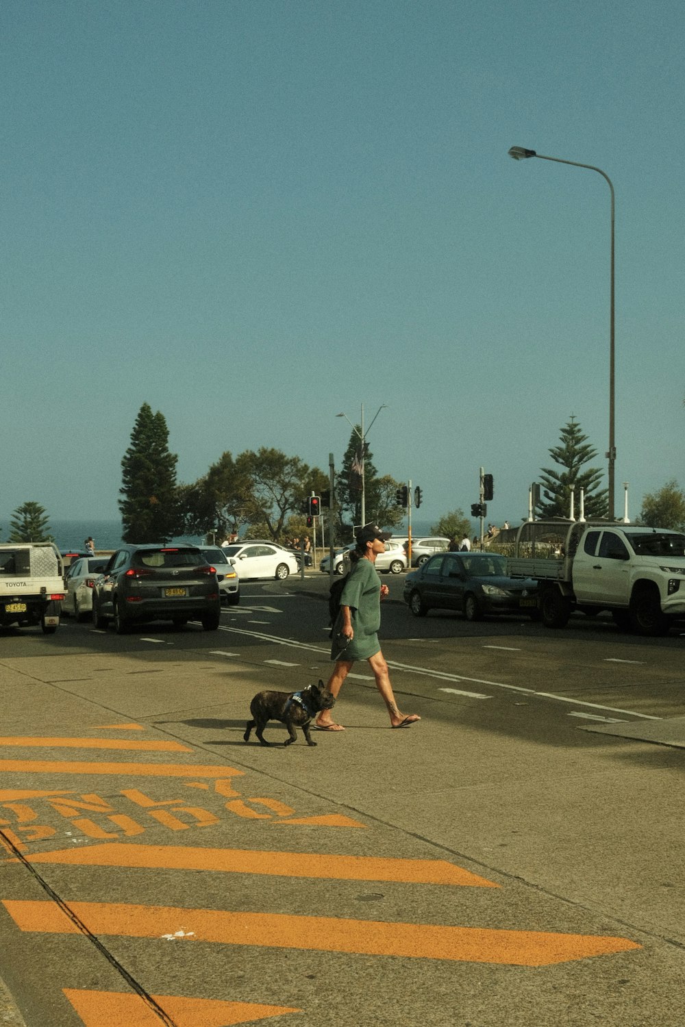 a person riding a skateboard in a parking lot