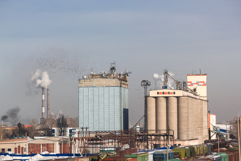 a factory with a lot of smoke coming out of it