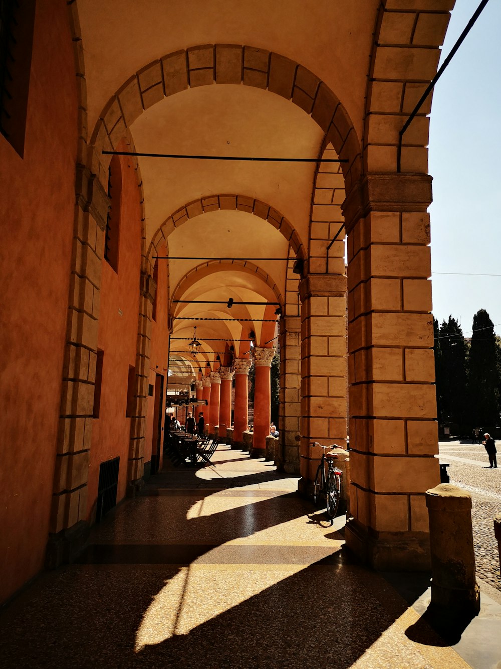 a row of arches on the side of a building