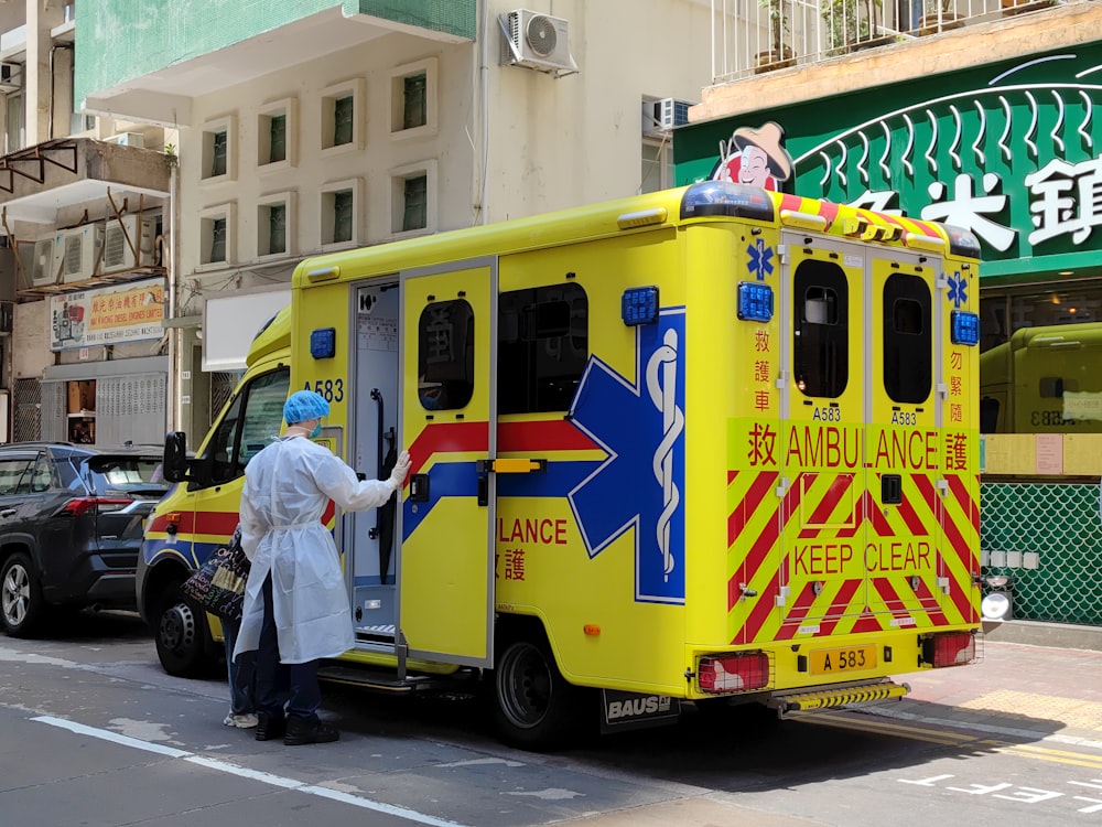 an ambulance is parked on the side of the road