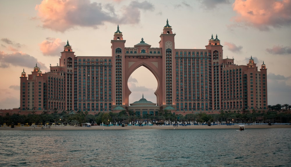 a large building sitting on top of a body of water