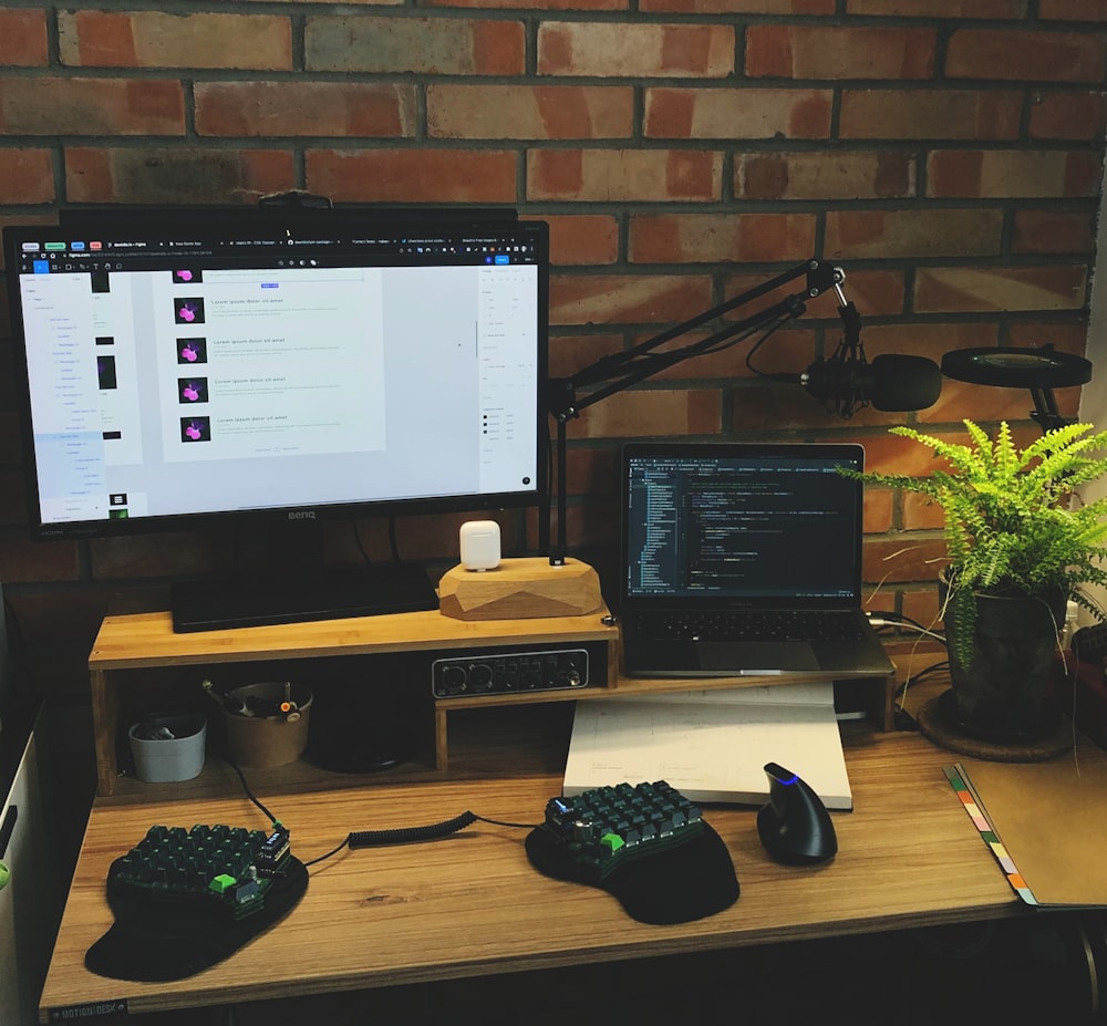 a desk with a monitor, keyboard and mouse