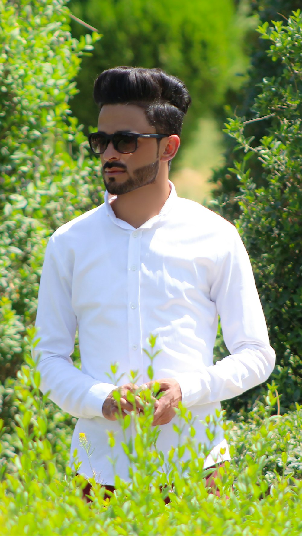 A man wearing sunglasses and a white shirt photo – Free Kabul ...