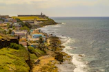 Scenic view of Pernambuco's coastline with vibrant local life.