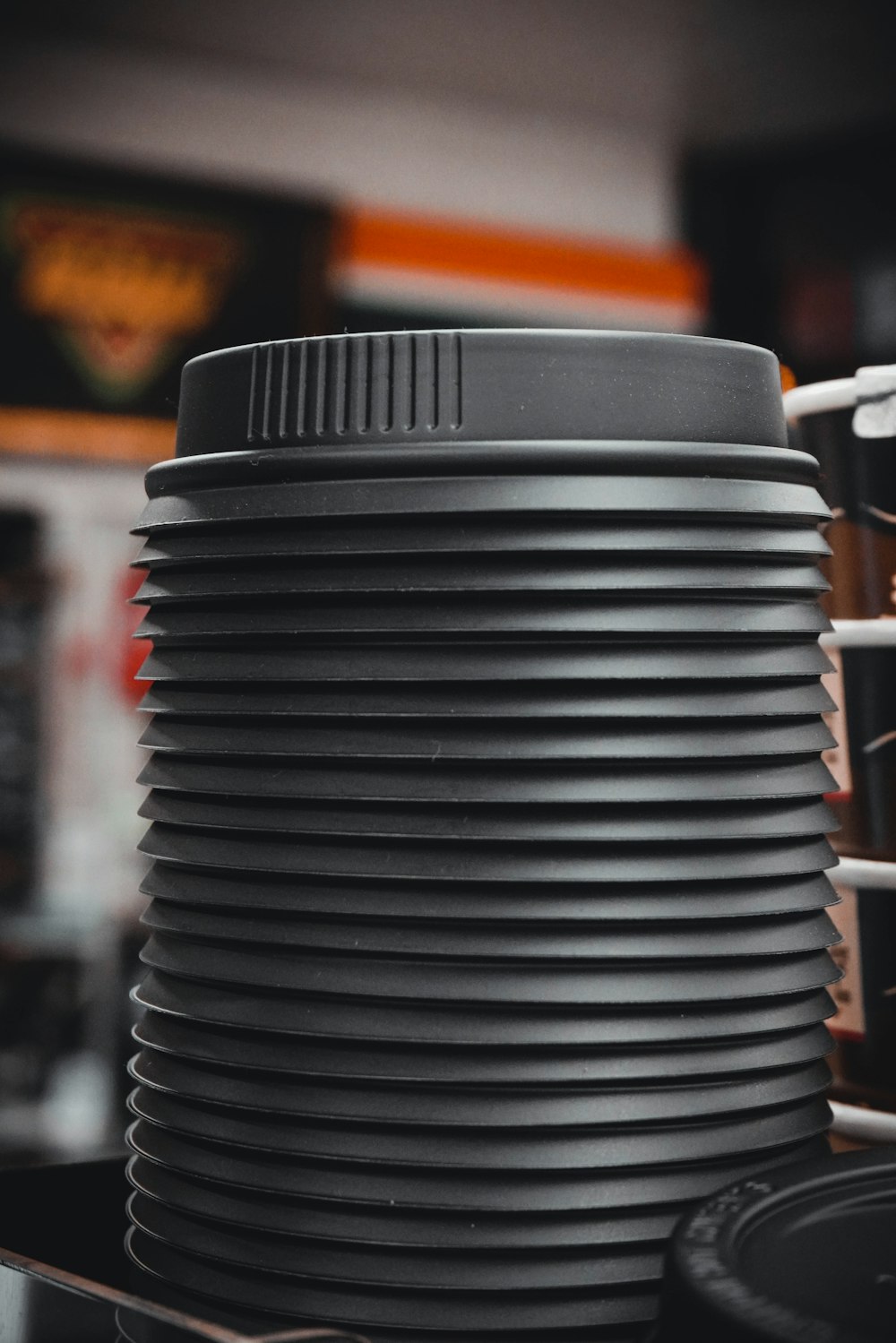 a stack of coffee cups sitting on top of a table