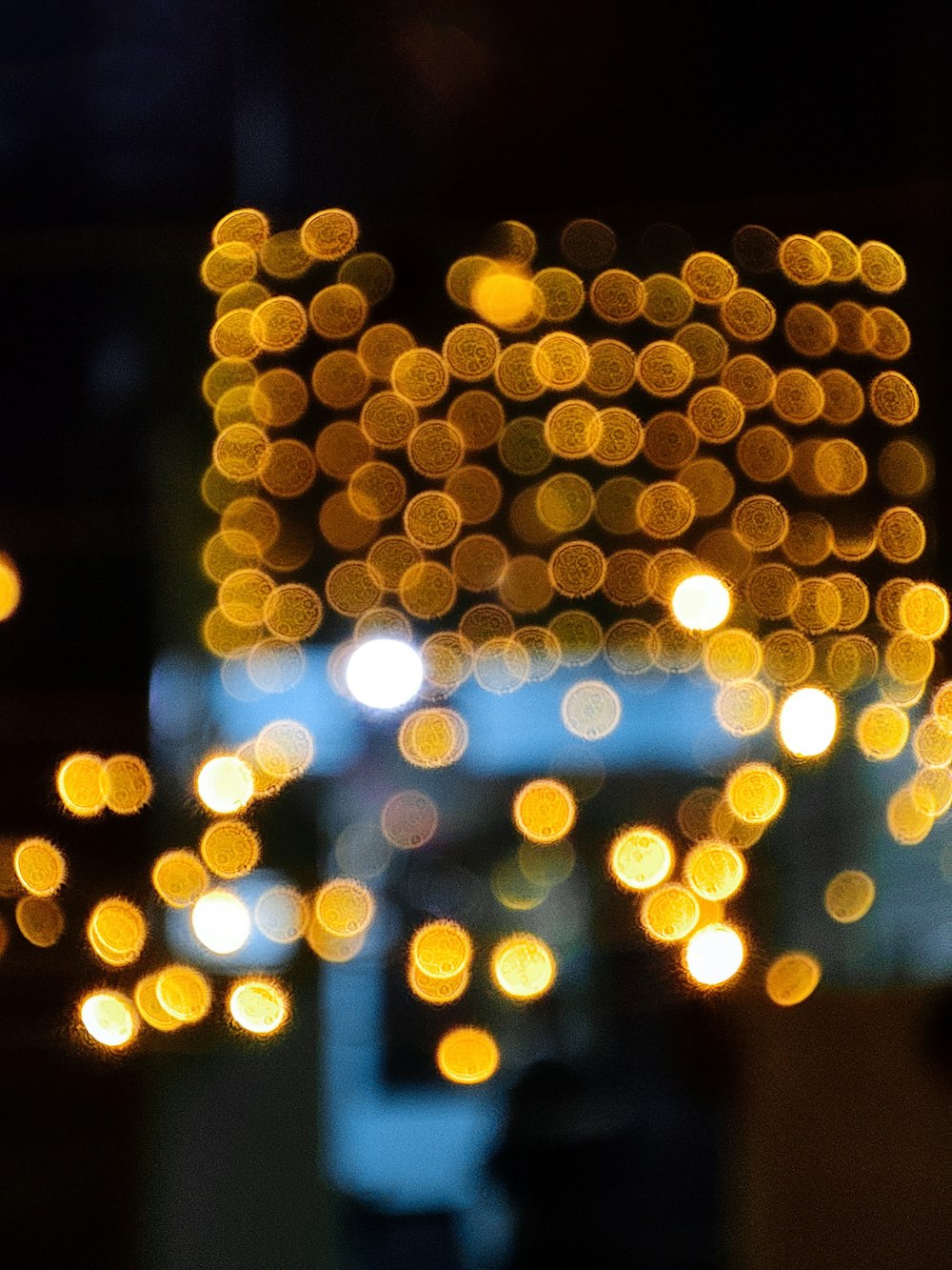 a blurry photo of a city at night