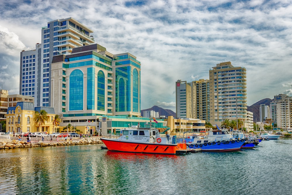 a group of boats that are sitting in the water