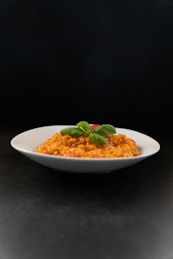 a white plate topped with macaroni and cheese