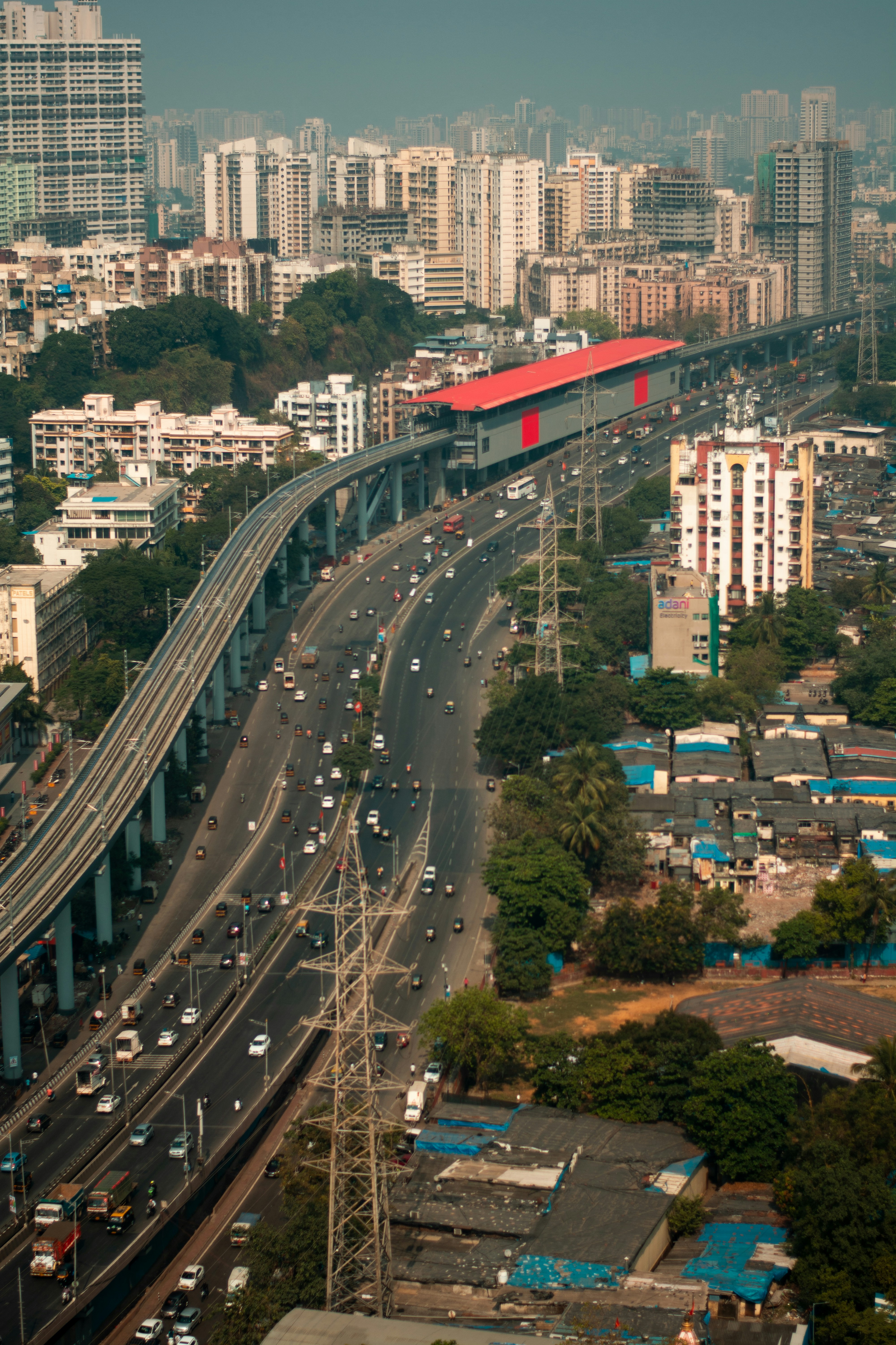 a city street with a bridge over it