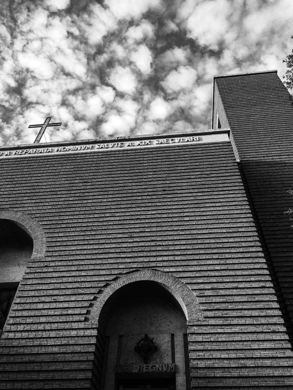 a black and white photo of a church