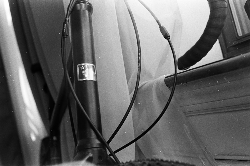 a black and white photo of a hair dryer
