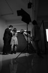 a couple of people that are standing in a room