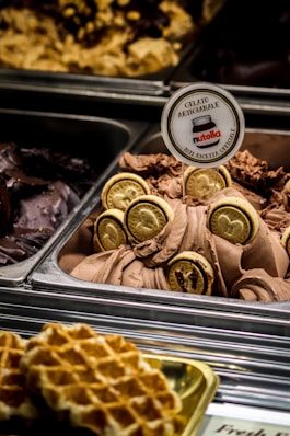 a close up of a waffle and other food items