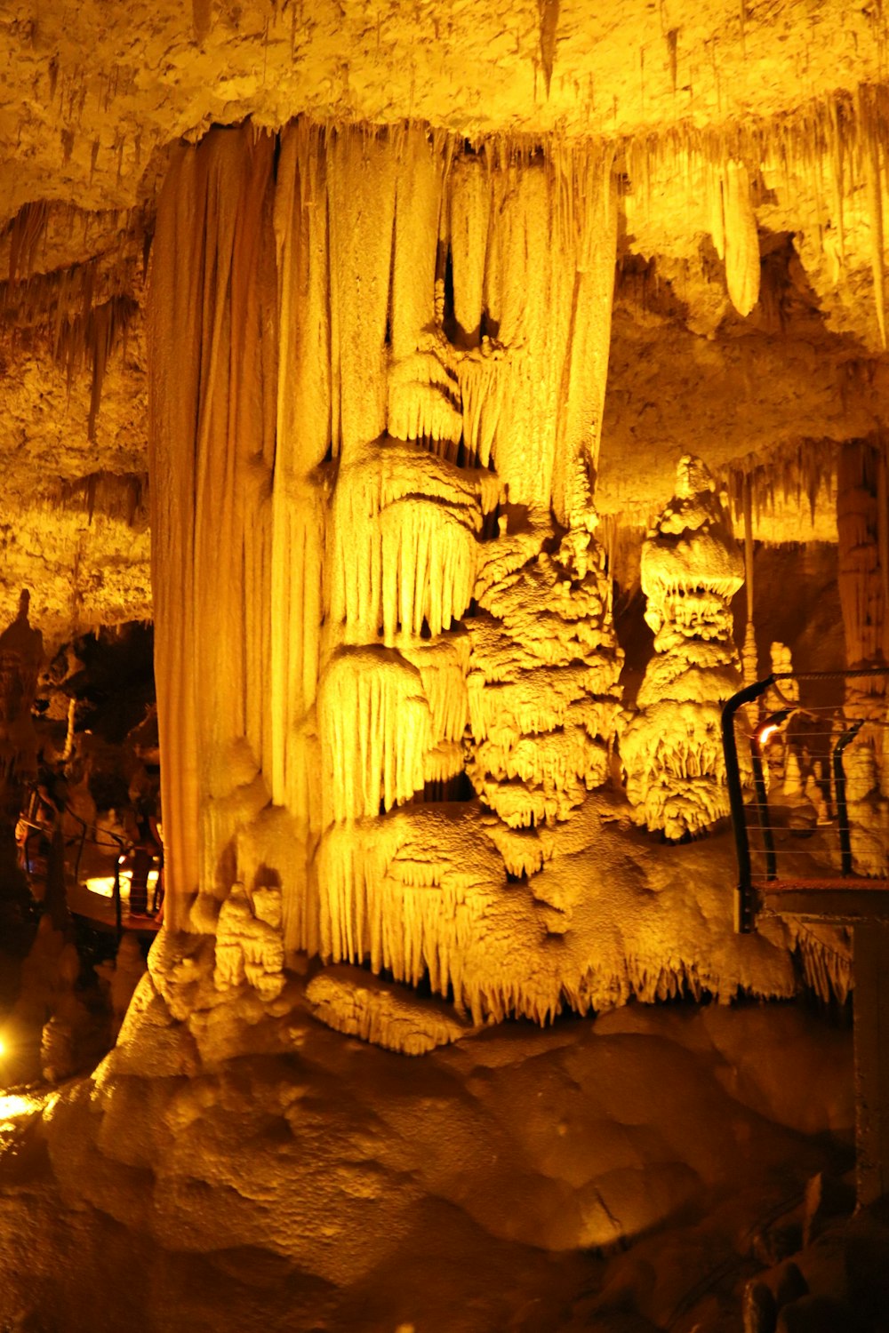 a group of people standing in a cave