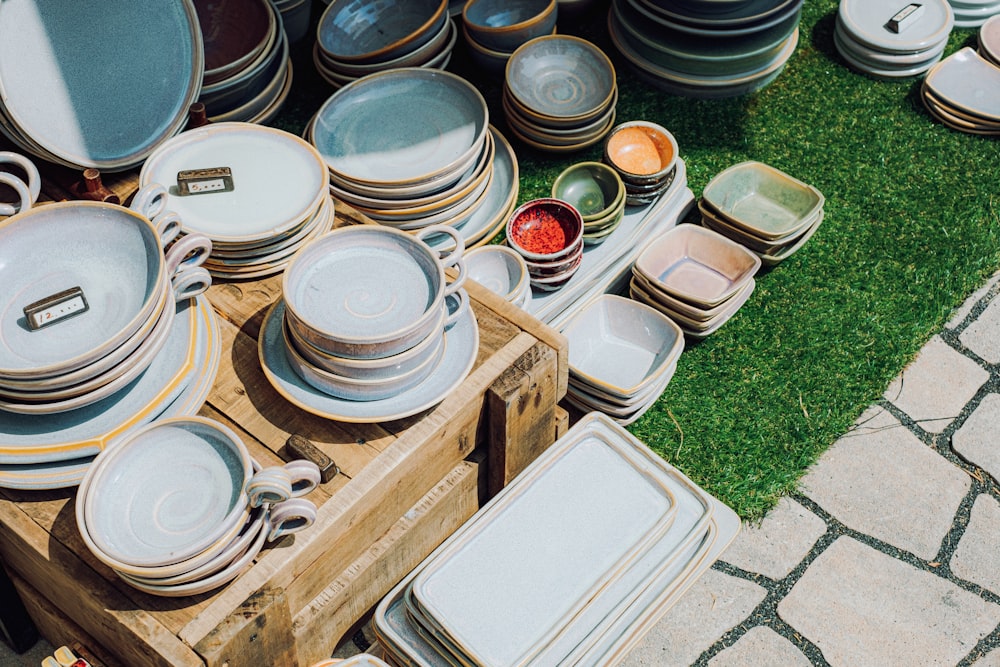 a bunch of plates that are on a table