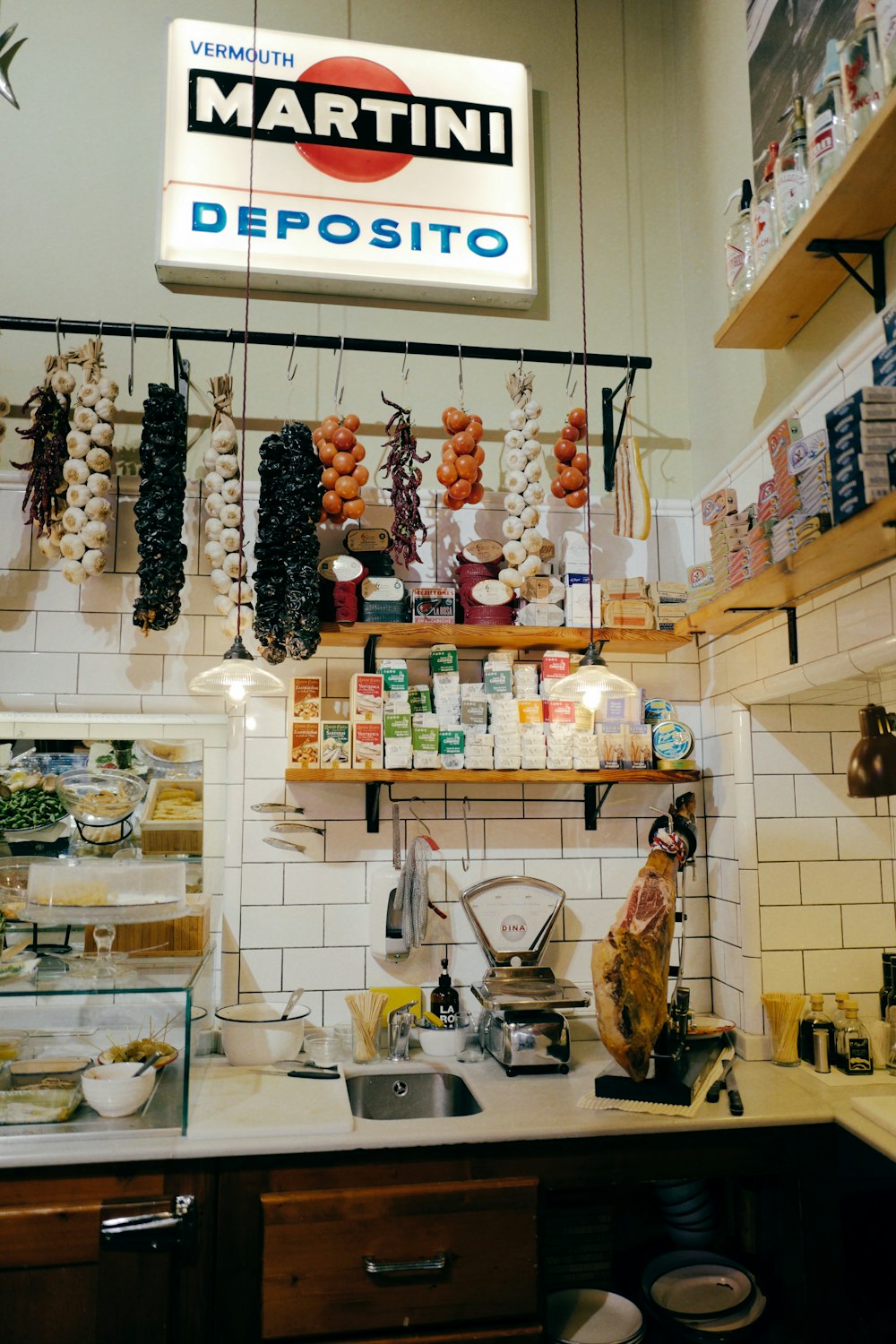 a counter in a store filled with lots of food