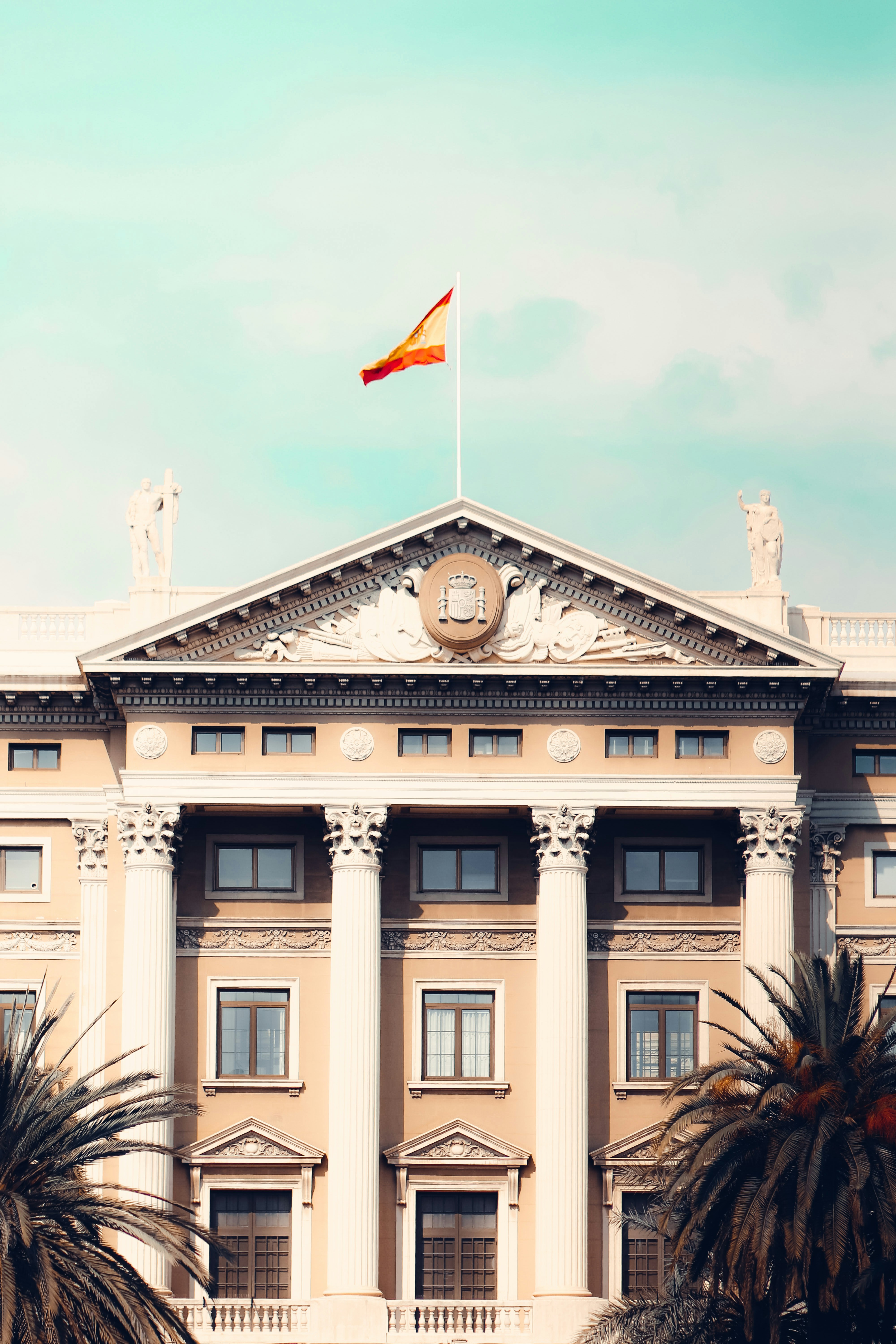 a large building with a flag on top of it