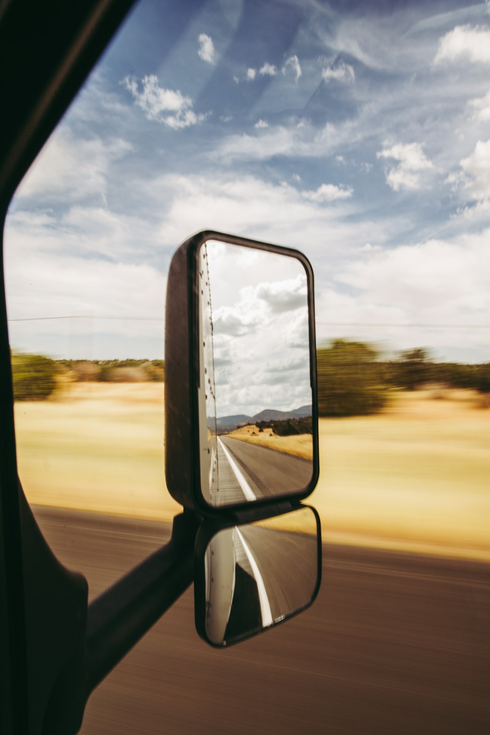 a rear view mirror on the side of a vehicle