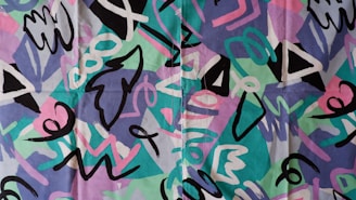 A chaotic mix of doodles and patterns overlapping in a wild composition.