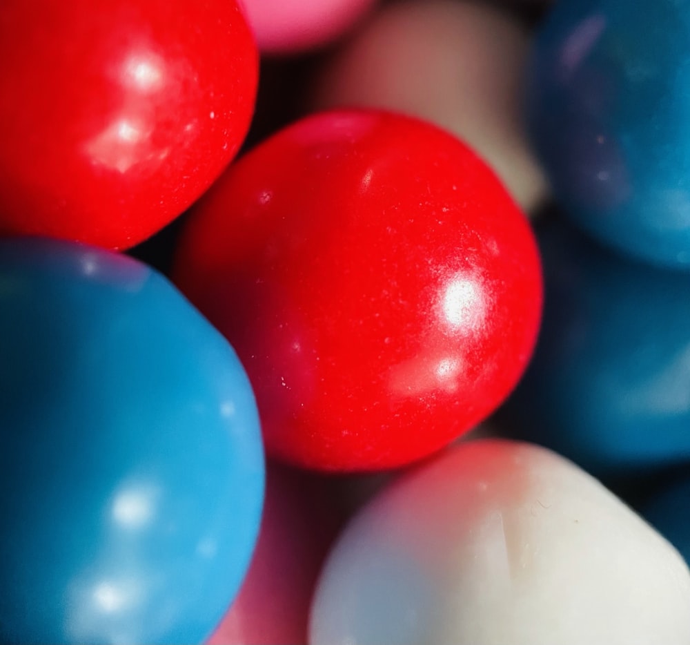 a close up of a bunch of candy balls