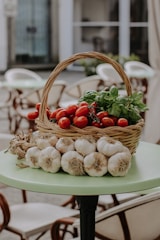 a basket of vegetables sitting on top of a table