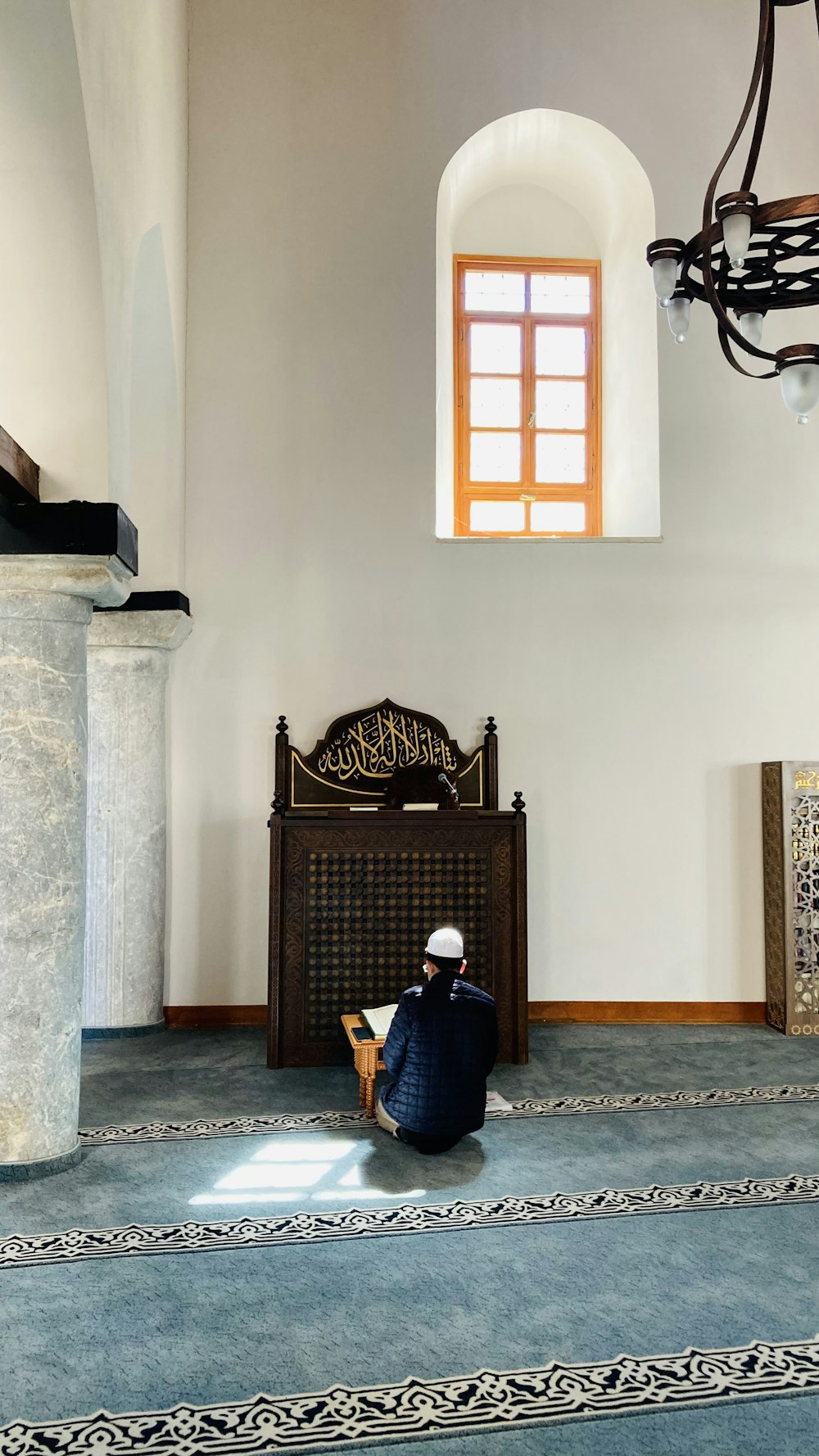 a person sitting on the floor in a room