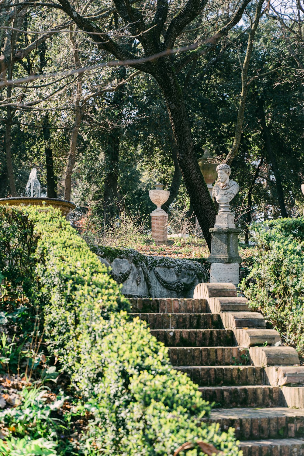 a set of stone steps leading up to a statue