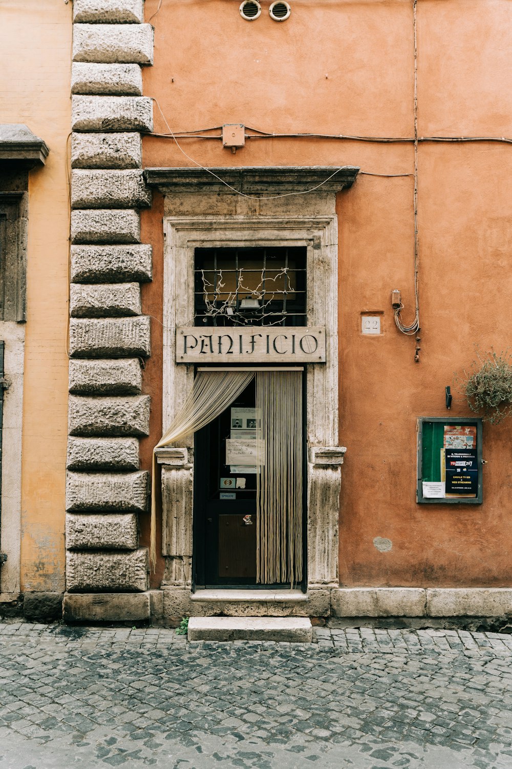 a building with a sign that reads pediccio