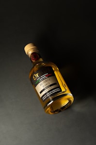 a bottle of liquor sitting on a table